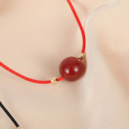 Collar de cuerda roja y negra de ónix