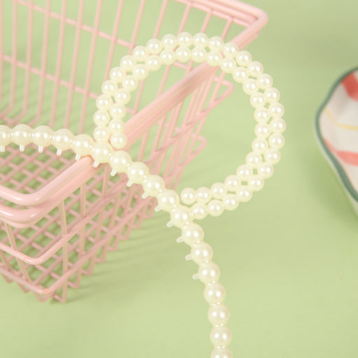 Diadema de perlas con orejas de oso