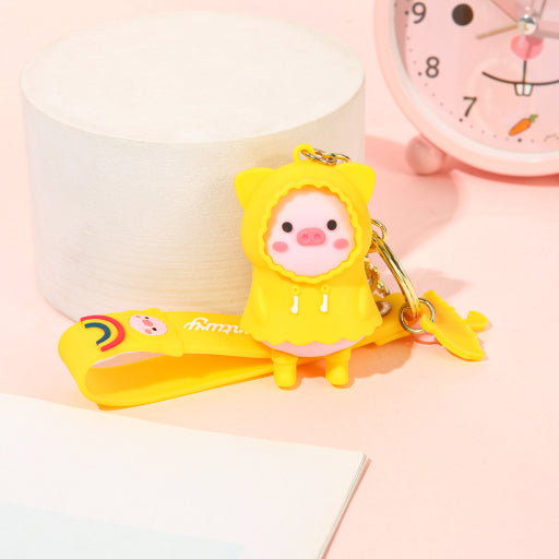 Llavero cerdito con impermeable