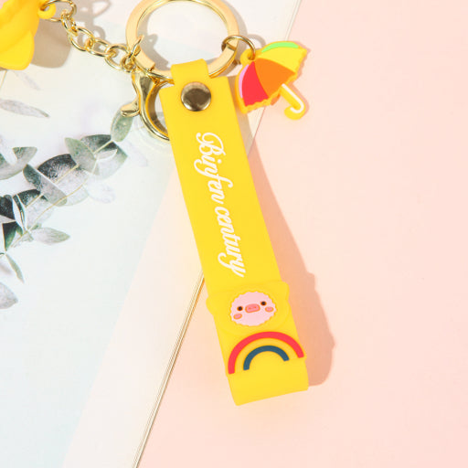 Llavero cerdito con impermeable
