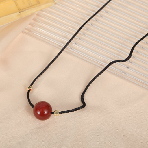 Collar de cuerda roja y negra de ónix