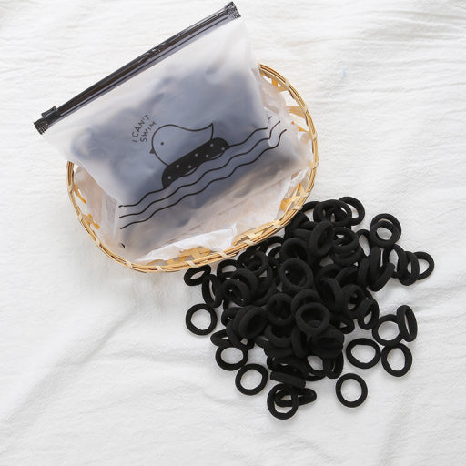 Bolsa con ligas para cabello