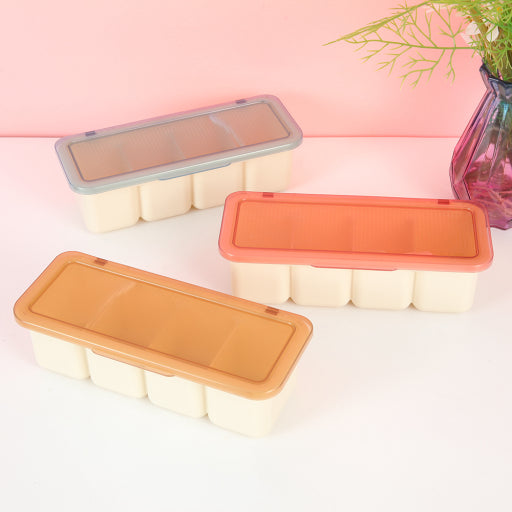 Caja de condimentos de cuatro compartimentos