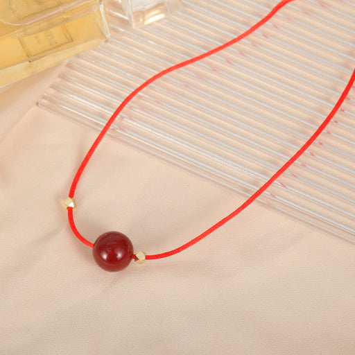 Collar de cuerda roja y negra de ónix