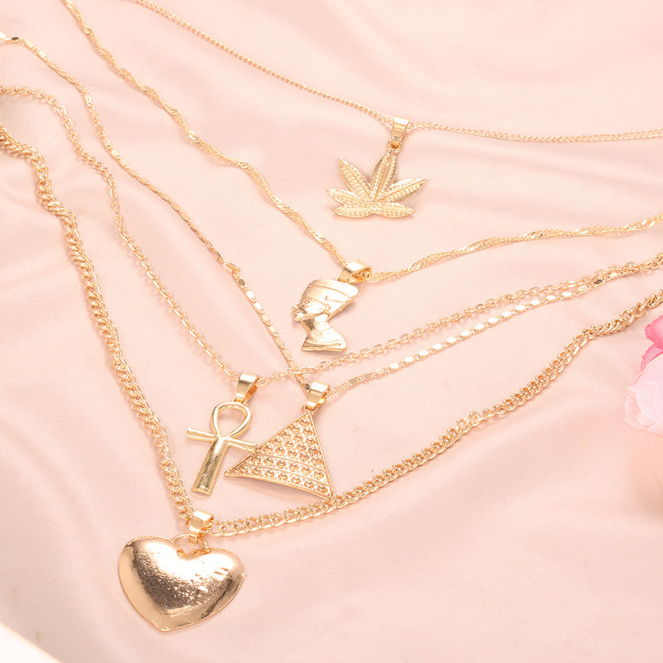 Juego de collares de corazón y flor