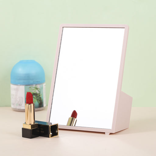 Espejo de mesa con almacenamiento cuadrado.
