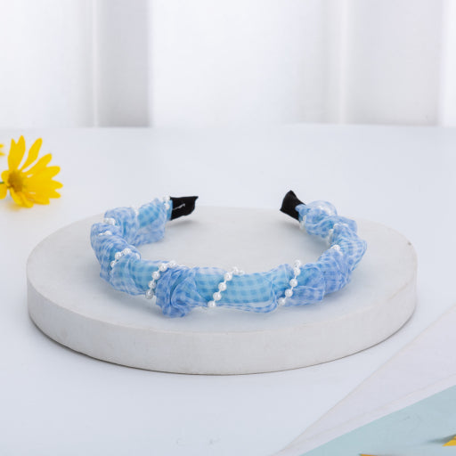 Diadema de tejido de perlas a cuadros