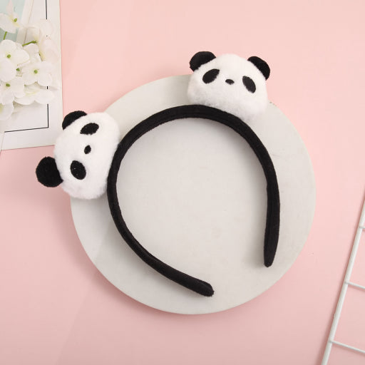 Aro de pelo panda blanco y negro