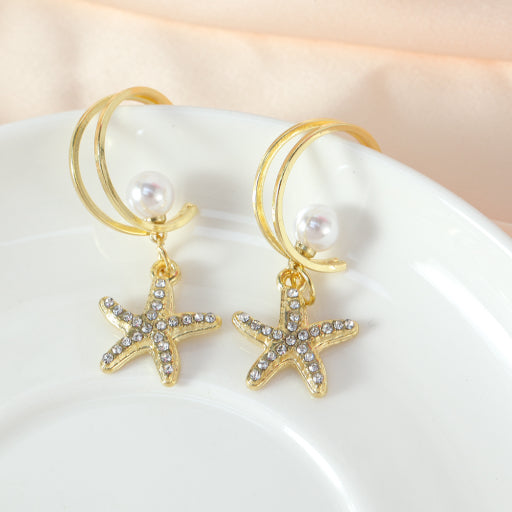Pendientes de perlas de estrella de mar (1 par)