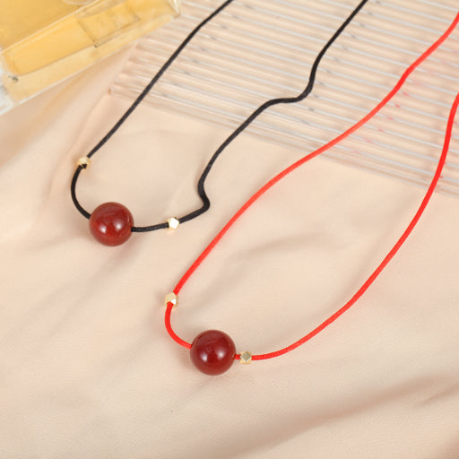 Collar de cuerda roja y negra de ónix