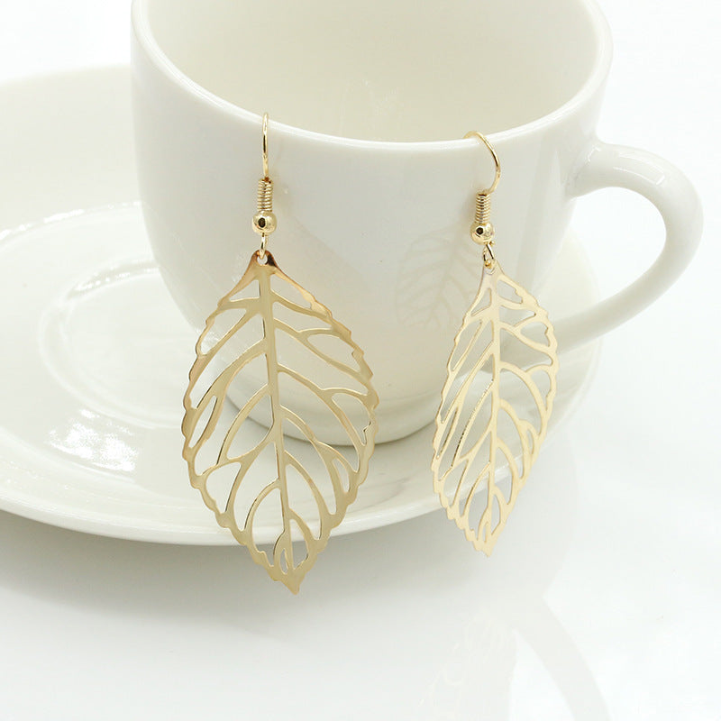 Juego de aretes en forma de hoja