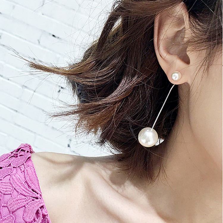 Hermosos aretes largos con perla