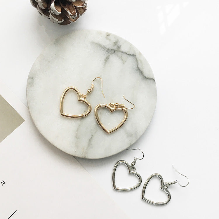 Juego de aretes en forma de corazón