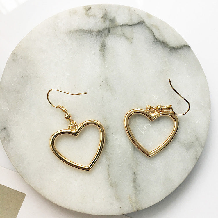 Juego de aretes en forma de corazón