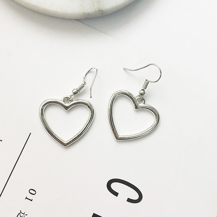Juego de aretes en forma de corazón