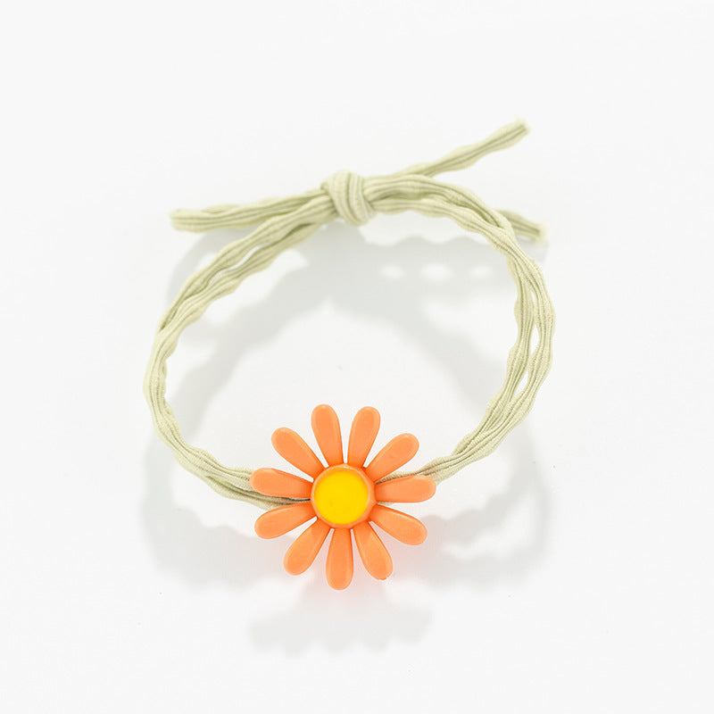 Dona para el cabello con flor