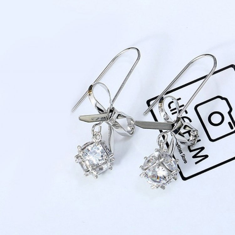 Hermosos aretes con diseño de flor