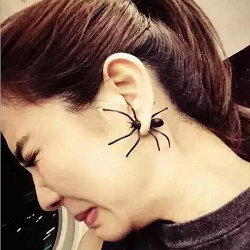 Juego de aretes con diseño de araña