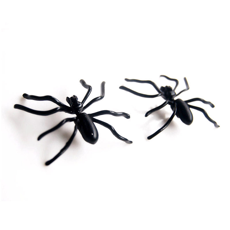 Juego de aretes con diseño de araña