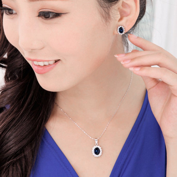 Juego de aretes con gargantillera de cristal