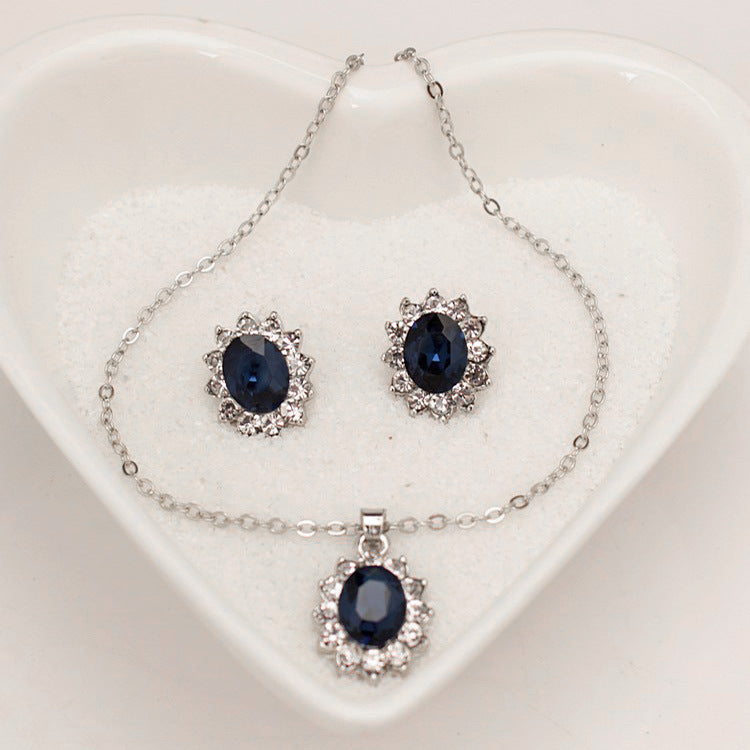 Juego de aretes con gargantillera de cristal