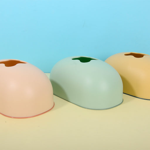 Caja de pañuelos ovalada, colores mixtos.
