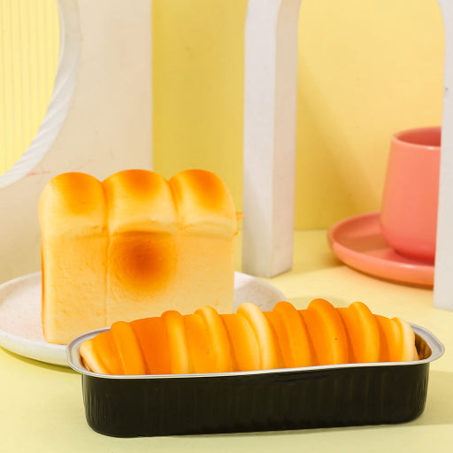 Juguete de rebote lento de pan y mantequilla.