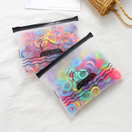 Bolsa con ligas para cabello