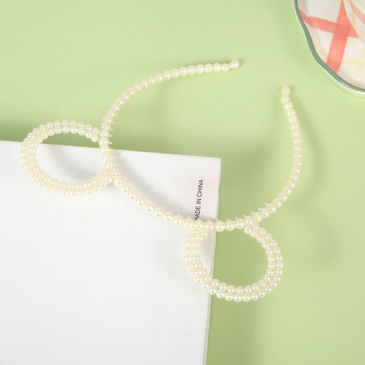 Diadema de perlas con orejas de oso