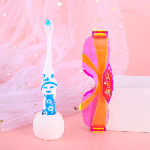 Set de cepillos de dientes para niños con gafas de sol.
