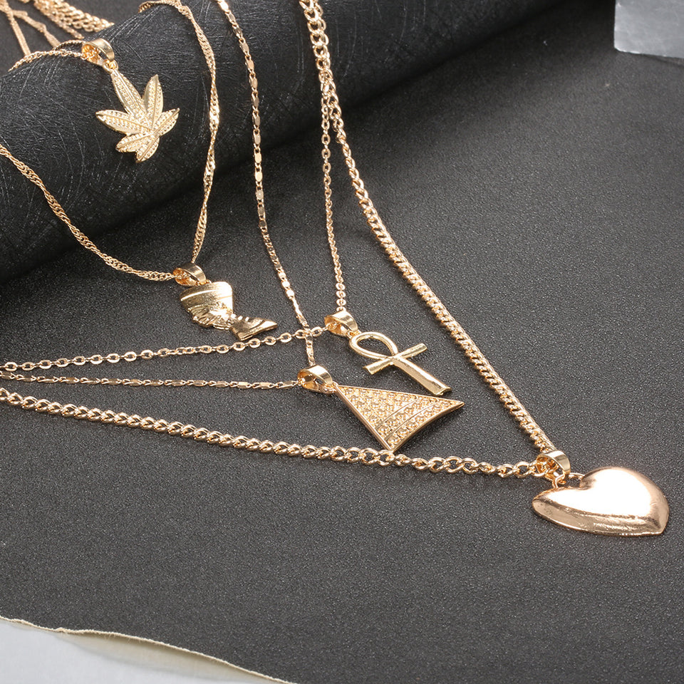 Juego de collares de corazón y flor