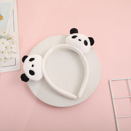 Aro de pelo panda blanco y negro