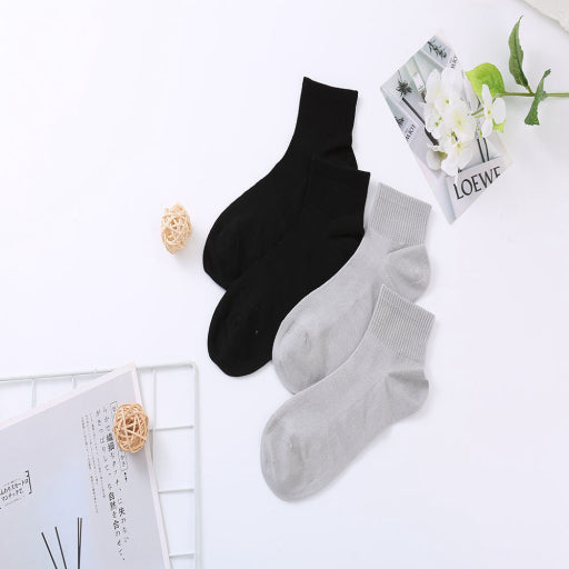 Calcetines de hombre transpirables de malla de color liso.