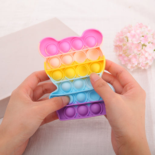 Juguete tabla de descompresión de oso