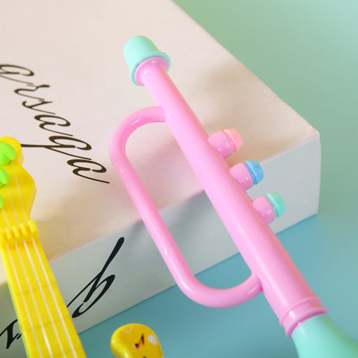 Pequeño instrumento musical bicolor.