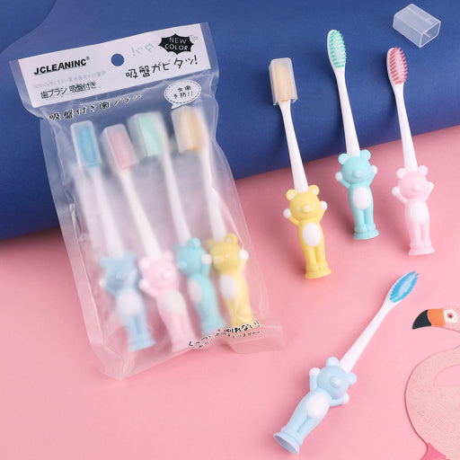 Cepillo dental con figura de oso