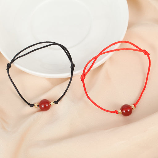 Pulsera de hilo rojo y negro de ónix