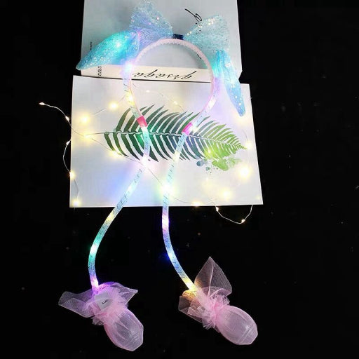 Diadema con orejas movibles
