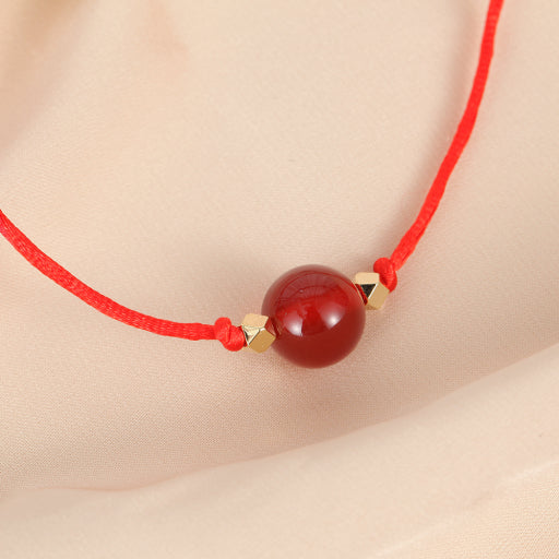 Pulsera de hilo rojo y negro de ónix