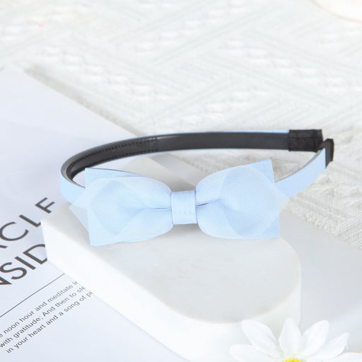 Diadema con moño de color liso de malla