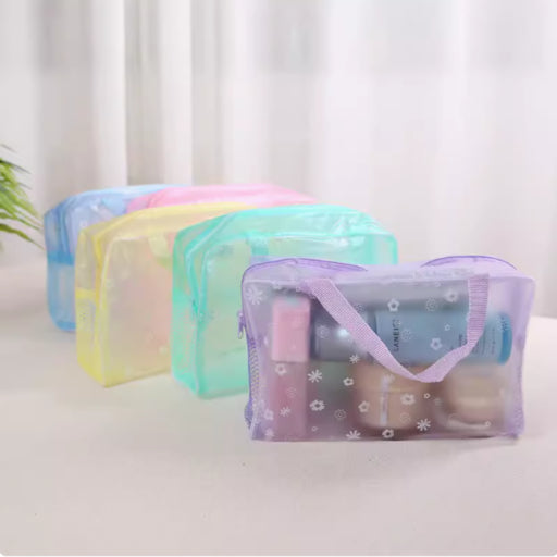 Cosmetiquera transparente con flores