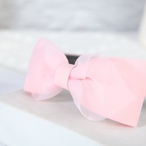 Diadema con moño de color liso de malla