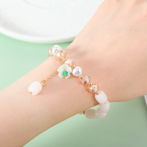 Pulsera de cuentas de colores y flores de perlas