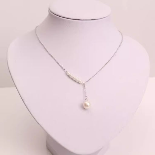 Lindo collar con perla