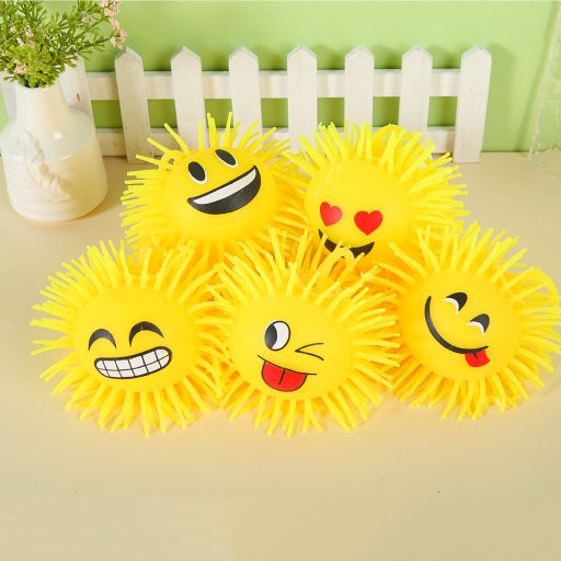 Linda bola de pelo emoji brillante