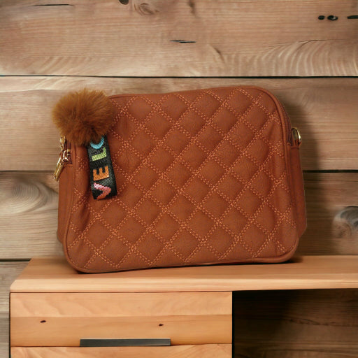 Bolsa con pompon